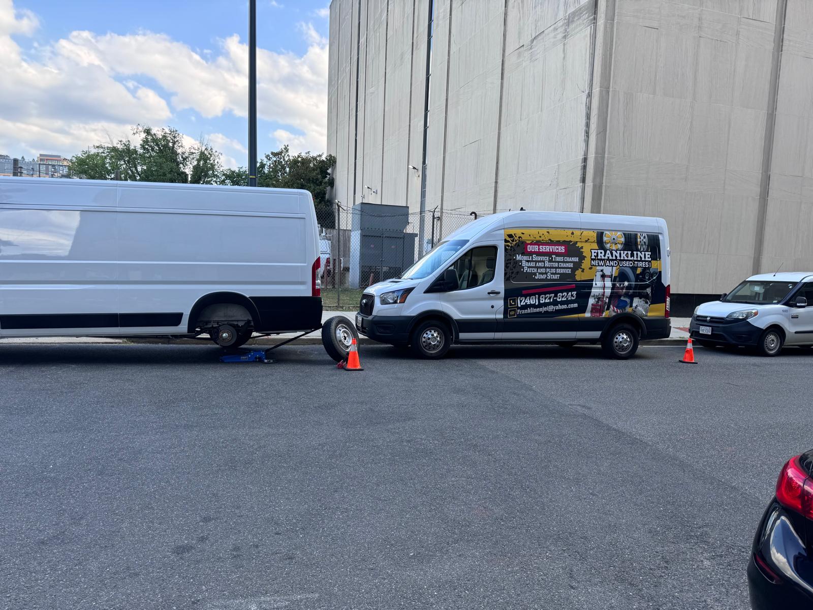 Frankline van servicing a box truck